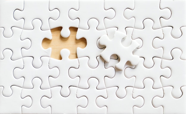 Premium Photo | Blank white jigsaw puzzle background