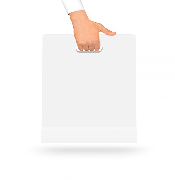 Download Blank white paper bag mock up holding in hand. Photo ...