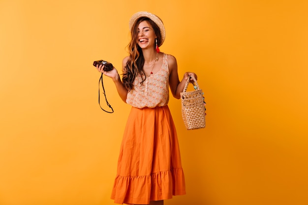 Free Photo | Blissful lady in trendy summer clothes posing with camera ...