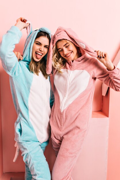 Free Photo | Blithesome women in funny sleepwear posing in weekend