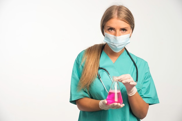 Free Photo Blonde Female Doctor In Blue Uniform With Stethoscope In