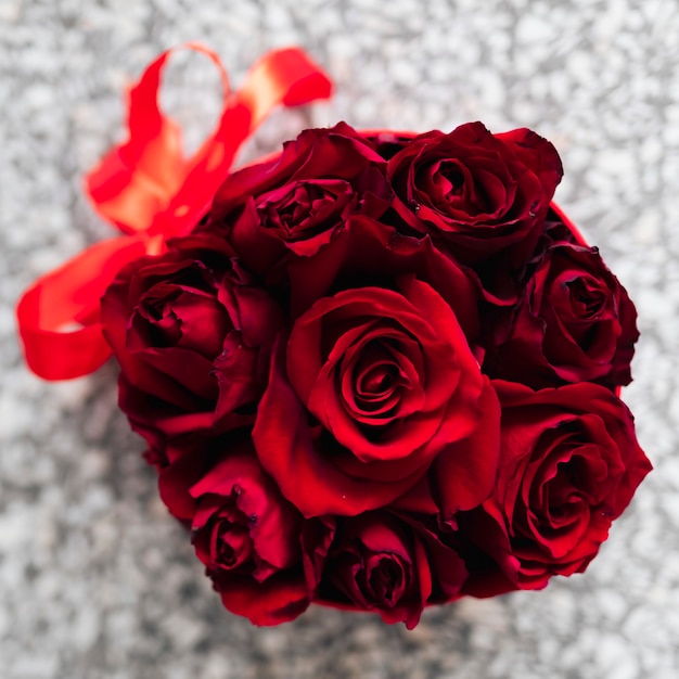 Blooming Red Roses In A Box Background