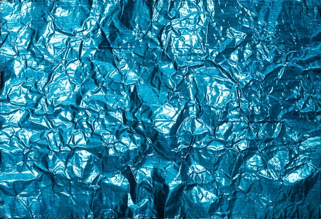 Premium Photo Blue Crumpled Foil Background