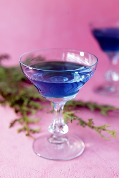 Premium Photo | Blue curacao alcohol coctail on pink background alcohol ...