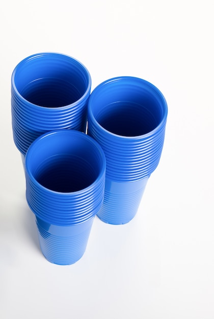 Premium Photo Blue Disposable Plastic Glasses