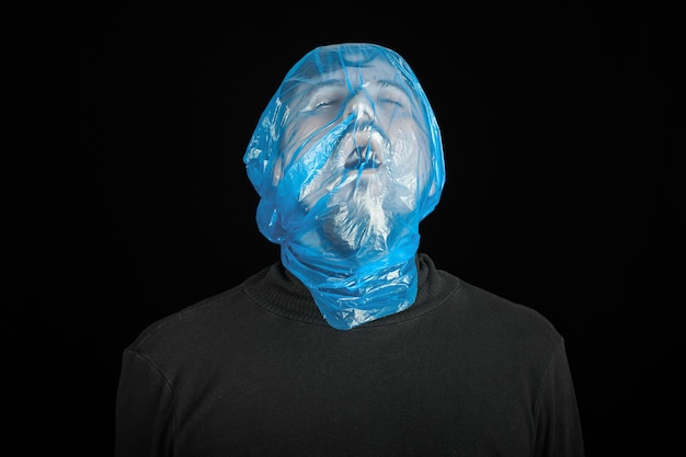 Premium Photo Blue Garbage Bag On Man Head Exit Bag For Suicide