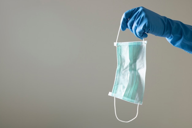 Premium Photo | Blue glove scientist protect virus bacteria ...