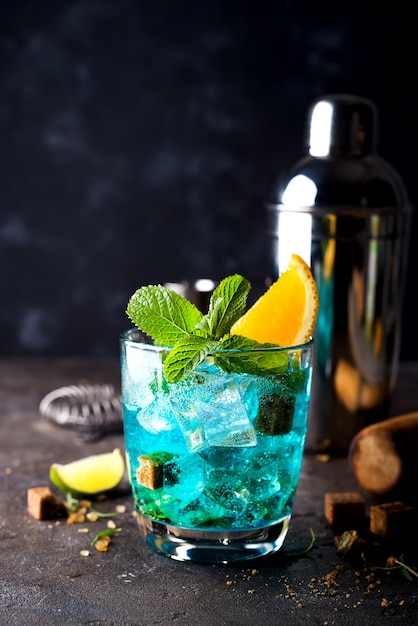 Premium Photo Blue Hawaiian Lagoon Cocktail On A Dark Concrete Background