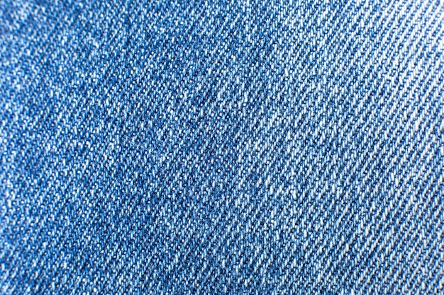 Premium Photo | Blue hipster jeans material. denim cloth texture ...