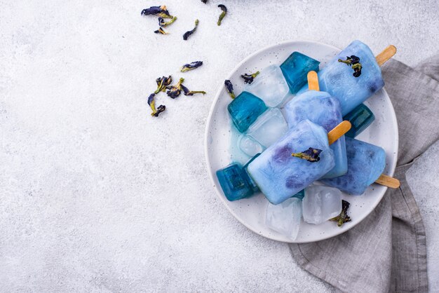 Premium Photo | Blue ice cream popsicle from butterfly pea