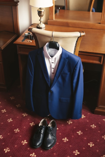 blue suit black shoes