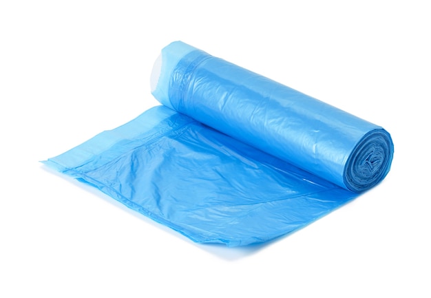 Premium Photo | Blue plastic trash bags with strings isolated on white ...