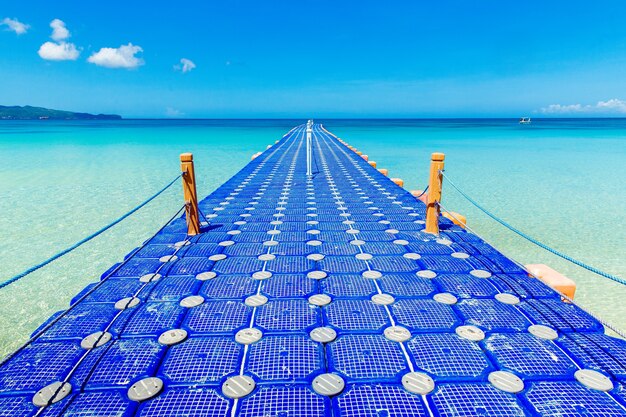 Premium Photo | Blue pontoon bridge in the tropical sea. nature view ...