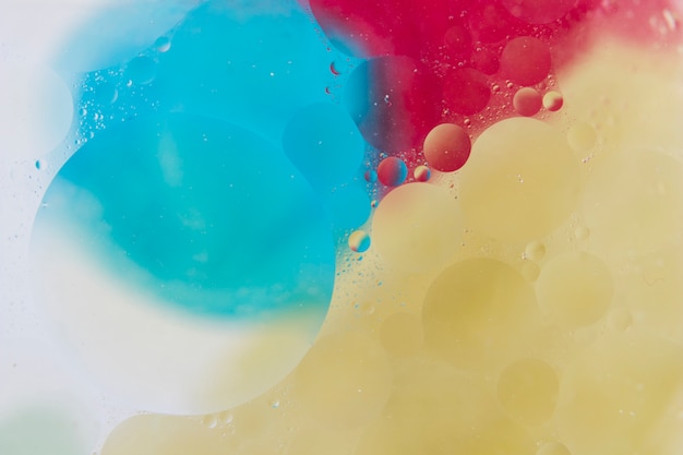 Free Photo | Blue; red and beige background with bubble pattern
