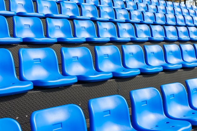 Premium Photo | Blue seats on the grandstand