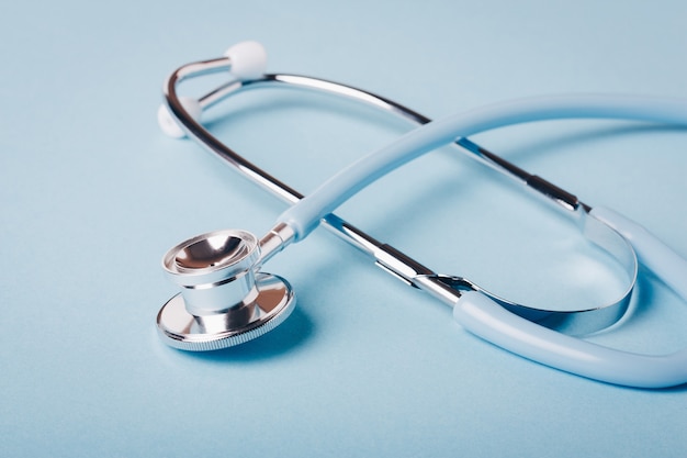 Premium Photo Blue Stethoscope On Blue Background