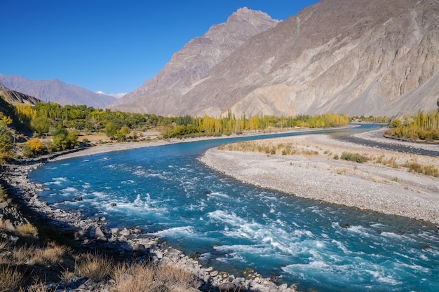 Premium Photo | Blue Water Of Gilgit River Flowing Through Gupis ...