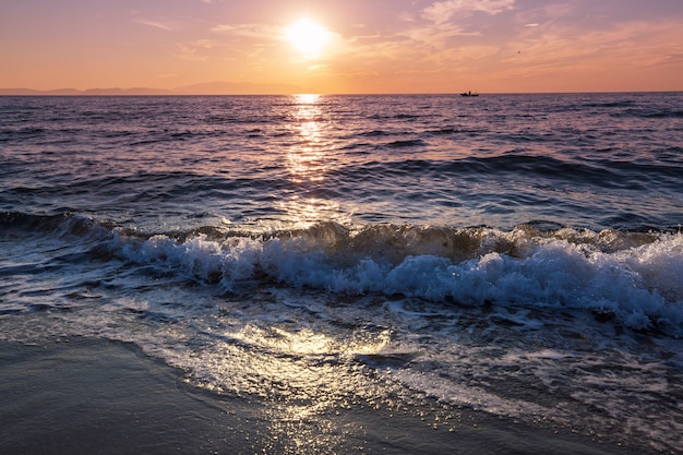 Premium Photo | Blue wave on the beach. blur background and sunlight ...