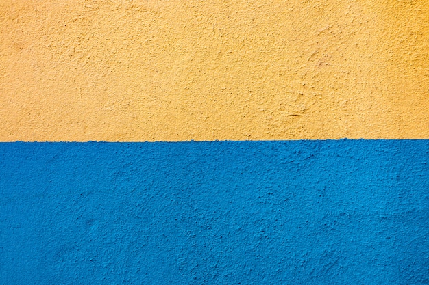 Premium Photo | Blue yellow wall background