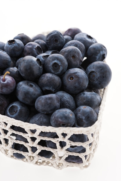 Download Free Photo | Blueberry basket isolated on white