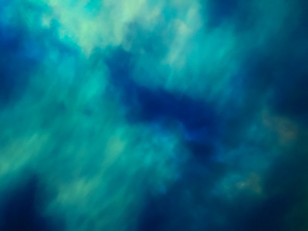 霧と雲とぼやけた明るいネイビーブルーとターコイズブルーの宇宙の背景 ぼかしとボケ味の抽象的なグラデーション 銀河の背景 ノーザンライトまたはポーラーライトの壁紙 プレミアム写真