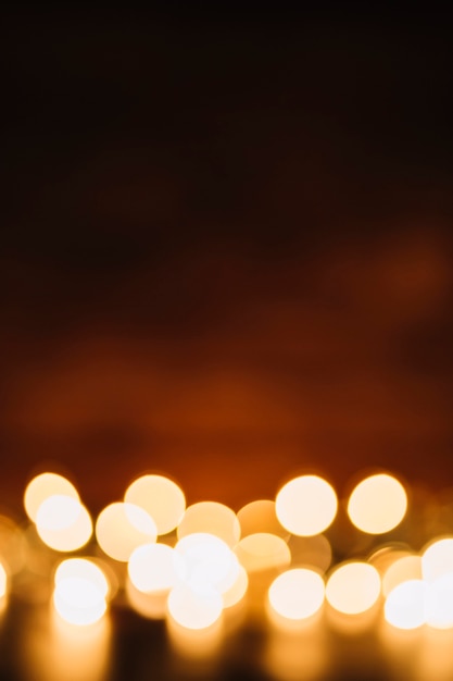 Premium Photo | Blurred fairy lights on dark