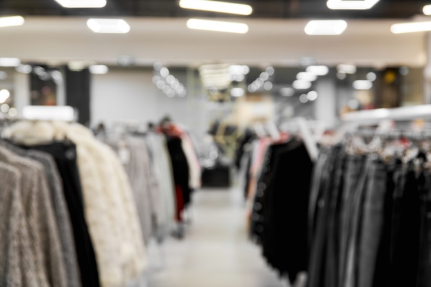 Premium Photo Blurred image background  with clothing  store