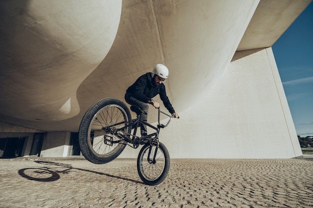 Premium Photo | Bmx Flatland Rider Doing A Spin