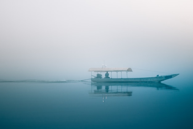 Premium Photo | Boat in the mist