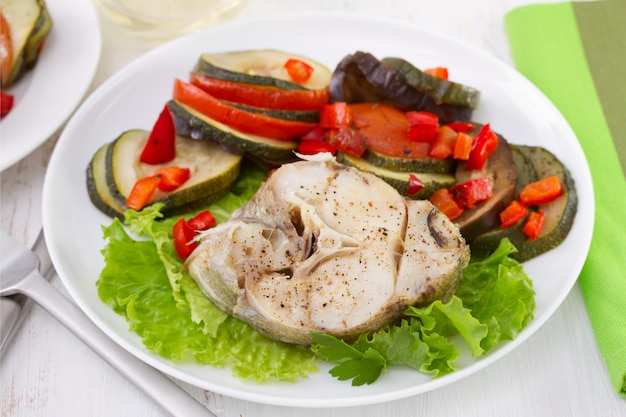 Premium Photo | Boiled Fish With Vegetables On The Plate