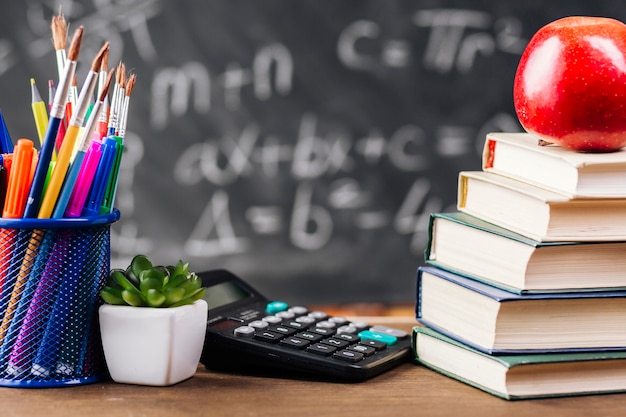 Books And Stationery At Teacher Desk Photo Free Download