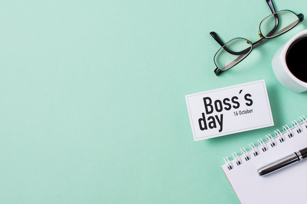 Free Photo | Boss's day assortment on light blue background with copy space