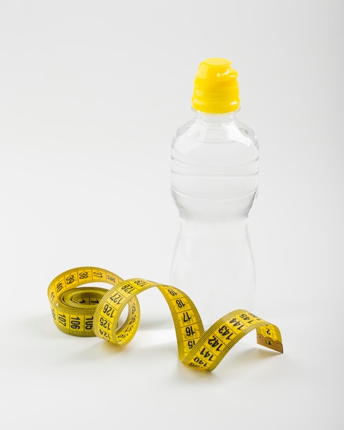 Download Free Photo Bottle Of Water And Yellow Centimetre Yellowimages Mockups