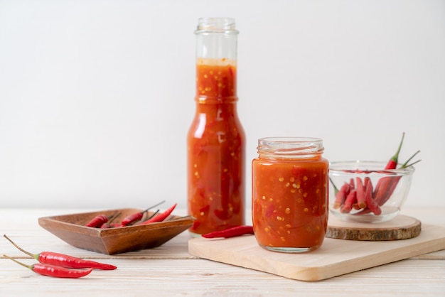 Premium Photo | Bottled chilli sauce