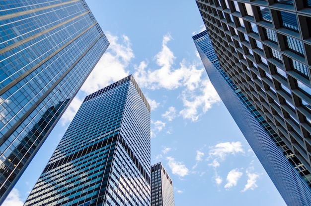 Premium Photo | Bottom view of skyscrapers in manhattan, new york, usa