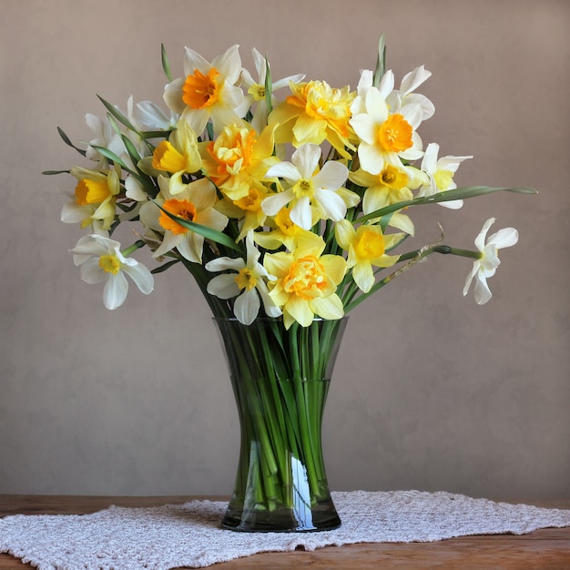 Premium Photo | Bouquet of spring garden flowers in a glass vase.
