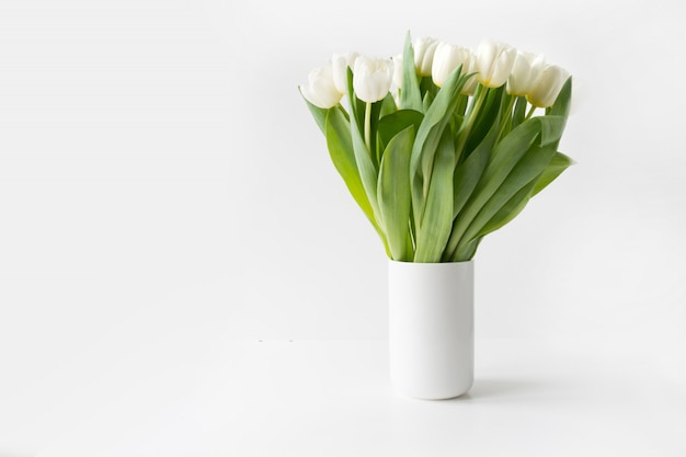 Premium Photo Bouquet Of White Tulip In Vase On White