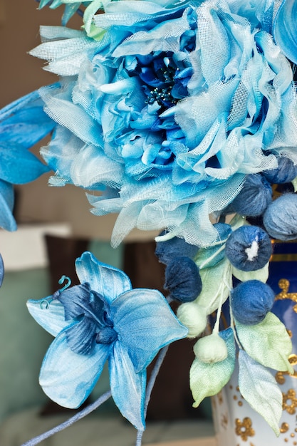 Premium Photo Bouquet With Blue Large Flowers And Closed Buds Artificial Flowers In A Vase For The Interior