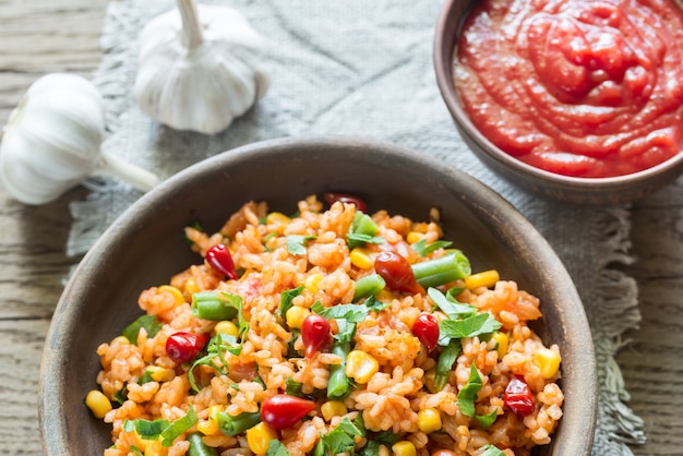 premium-photo-bowl-of-mexican-rice-with-tomato-sauce