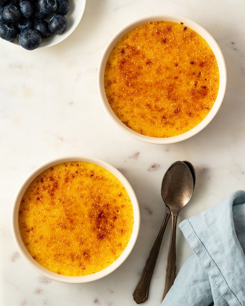 Premium Photo | Bowls with creme brulee