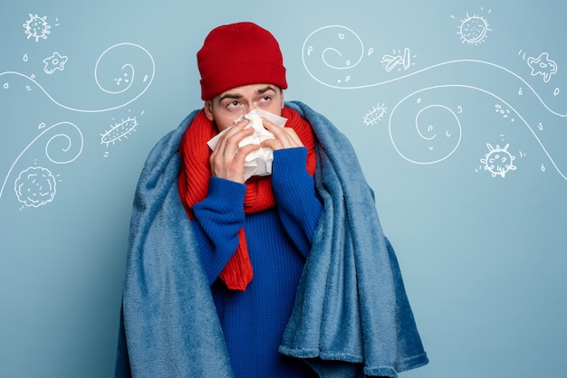 Premium Photo | Boy caught a cold and uses pills to heal.