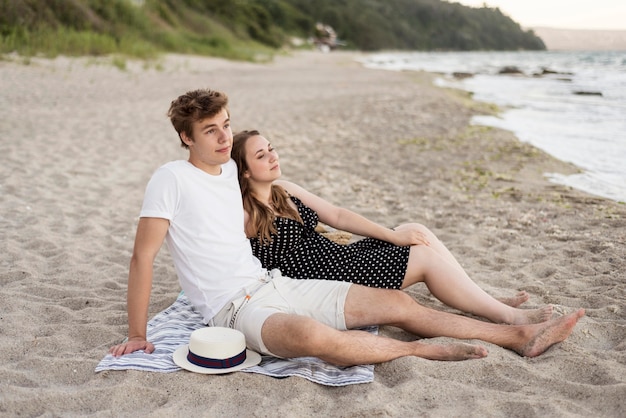 Free Photo Boy And Girl Staying Together On The Beach