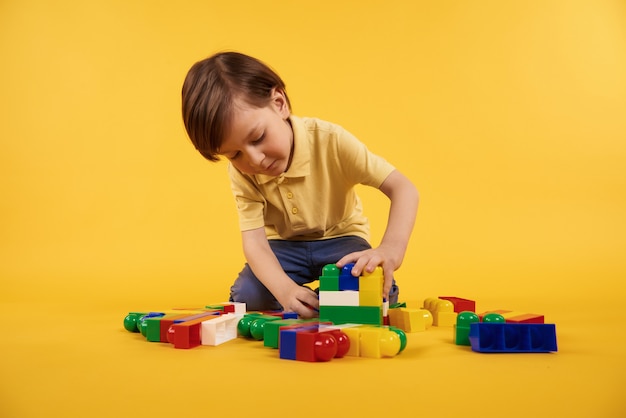 boy playing with toys