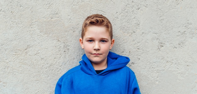 boy in blue hoodie