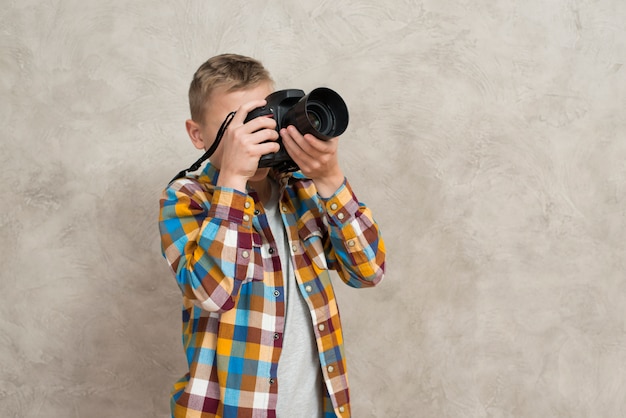 Free Photo | Boy with camera