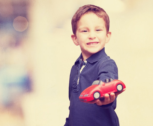 boy with toy car