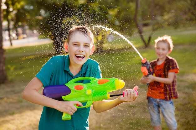 Boys Having Fun Playing With Water Guns 133179 231 