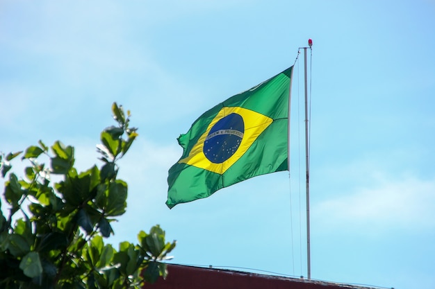 Premium Photo Brazilian Flag Flying In The Open Air In Rio De Janeiro Brazil