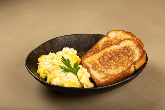 Premium Photo | Breakfast scrambled egg with toast