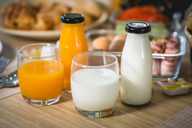 Premium Photo Breakfast With Milk Orange Juice French Bread Or Baguette With On The Dining Table In The Morning